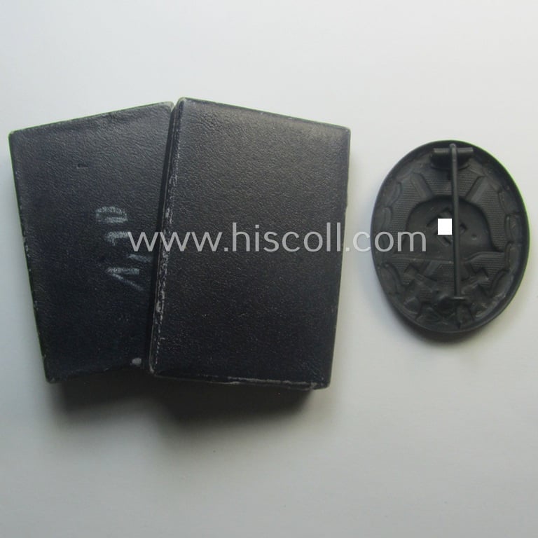 'Verwundeten-Abzeichen in Schwarz' being a maker- (ie. 'L/11'-) marked example by the company: 'Wilhelm Deumer' and that came stored in its typical, blue-toned 'LDO'-type etui (ie. two-pieced-box)