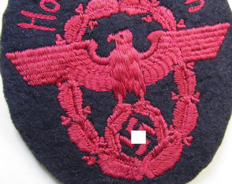 Police- (ie. 'Polizei'-) related arm-eagle (ie. 'Ärmeladler') as was intended for usage by the various staff-members of the: 'Feuerlöschpolizei Hohenmemmingen' (or: specific police-related fire-brigades)