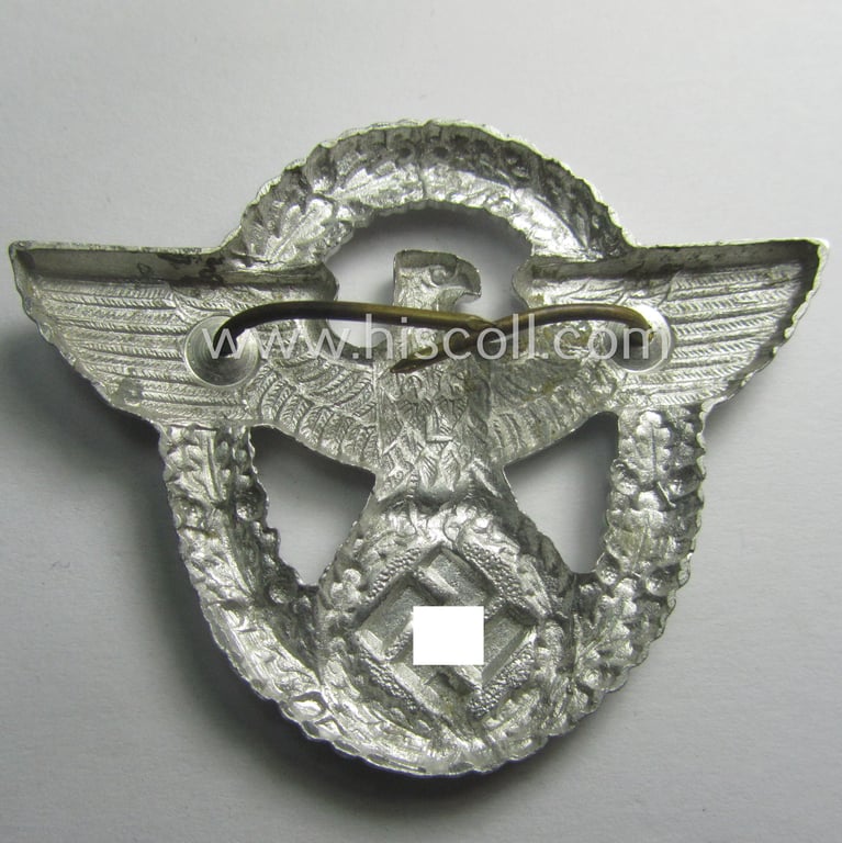 'Standard-issue'-pattern - and typical aluminium-based - 'Polizei'- (ie. police) visor-cap eagle being a bright-silver-coloured (and maker- ie. 'OLG'-marked) example as was intended for usage on the various 'Polizei' (ie. police) visor-caps
