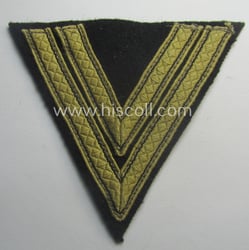 Waffen-SS-type 'Armwinkel' (or: rank-chevron) as executed on black-coloured...