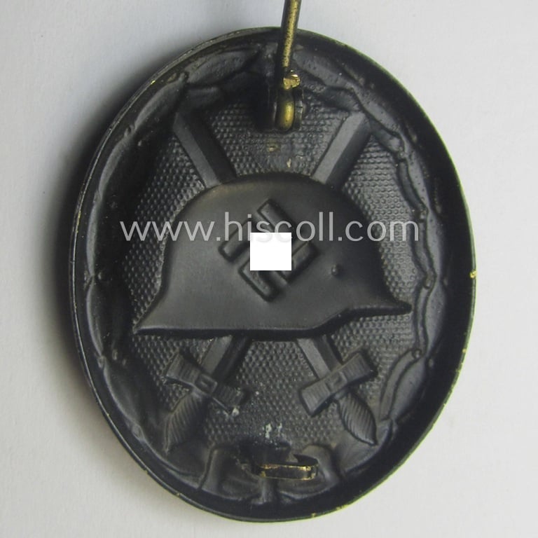Moderately used- and/or worn black-class wound-badge (or: 'Verwundeten-Abzeichen in Schwarz') being a typical non-maker-marked (and non-magnetic) example