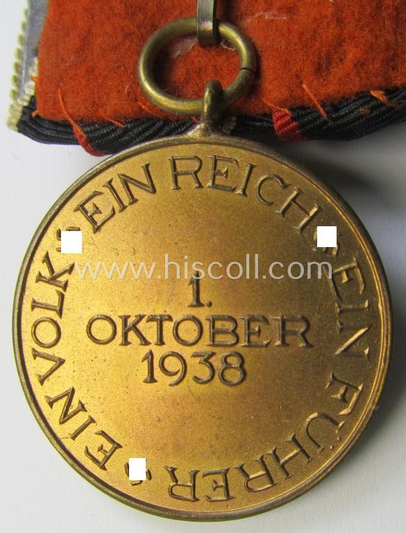 Attractive, 'variant'-pattern, bright golden-toned WH (Heeres o. KM etc.) so-called: 'Einzelspange' (being of the desirable 'detachable'-pattern) showing a WH Czech 'Anschluss'- (ie. occupation-) medal: '1 October 1938'