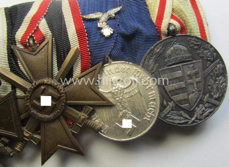 5-pieced, WWI- (ie. TR-) period, WH (Luftwaffe) medal-bar (ie. 'Ordenspange') resp. depicting an: 'EKII.Kl.', an: 'FKK 14-18 m. Schw.', a: 'KvK II.Kl. m. S.', a: WH (LW) 'DA 4. Stf. ' and an Austrian WWI-commemorative medal