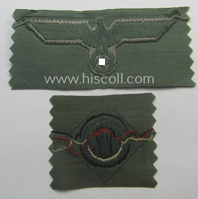 Early- (ie. mid-) war-period, WH (Heeres) cap-eagle & cocarde-set (ie. 'Schiffchenmützen-Adler u. Kokarde-Satz für Mannschaften u. Uffz.') being a 'virtually mint' set as executed in bluish-grey-coloured linnen on a field-grey-coloured background