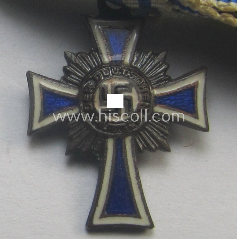 Unusually seen - and very small-sized! - miniature of an: 'Ehrenkreuz der deutschen Mutter - dritte Stufe' (or: bronze-class mothers'-cross) being a (typical) non-maker-marked example