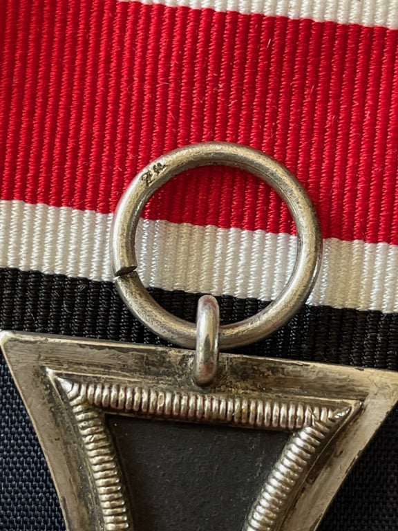 WWII GERMAN IRON CROSS 2ND CLASS NUMBERED RING 24 FOR ARBEITSGEMINSCHAFT FUR HEERESHEDARF IN DER GRAVEUR UBD ZISELIERUNG