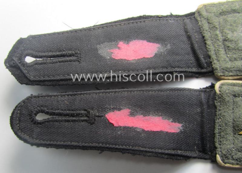 Superb pair of Waffen-SS NCO-type, 'cyphered' shoulderstraps as piped in the white-coloured branchcolour as was intended for usage by an: 'SS-Oberscharführer' who served within the: SS-Rgt. 'Deutschland' (2. SS-Pz-Div. "Das Reich")