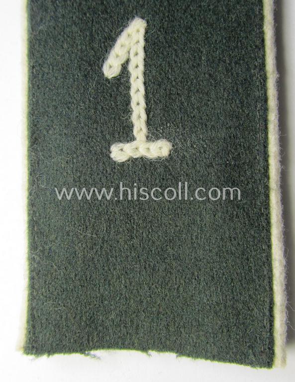 Single - and actually not that often seen! - WH (Heeres) EM-type (ie. 'M36-/M40'-pattern- and/or: 'rounded styled-') neatly 'cyphered' shoulderstrap as was intended for usage by a: 'Soldat des Infanterie-Regiments 1'
