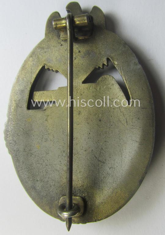 'Panzerkampfabzeichen in Bronze' (or: bronze-class panzer assault badge or PAB) being a neat (I deem) somewhat later-war-period zinc- (ie. 'Feinzink'-) version as was procuced by the: 'Frank u. Reif'-company