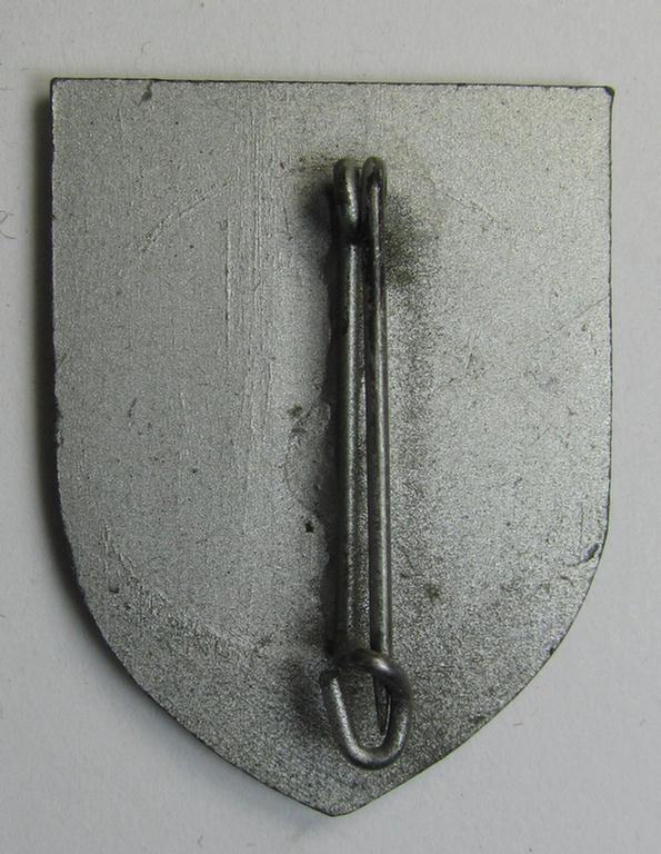 Attractive - and actually quite scarcely encountered! - WH (Heeres) so-called: 'Truppen-Traditionsabzeichen des 215. Infanterie Division' as executed in greyish-coloured zinc-based metal (ie. 'Feinzink')