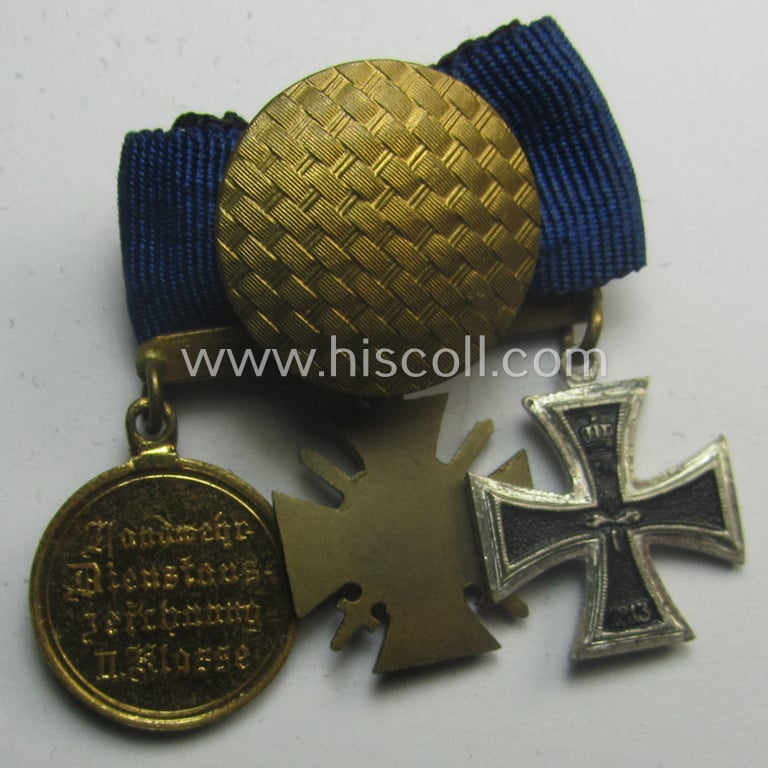 3-pieced, 'WWI'-period medal-bar (ie. 'Ordenspange') resp. depicting an: 'EK II.Kl.', a: 'FKK 1914-18 mit Schwn.' and a: 'Landwehr DA 2. Kl. 1913' that comes with its accompanying miniature 'Feldspange'