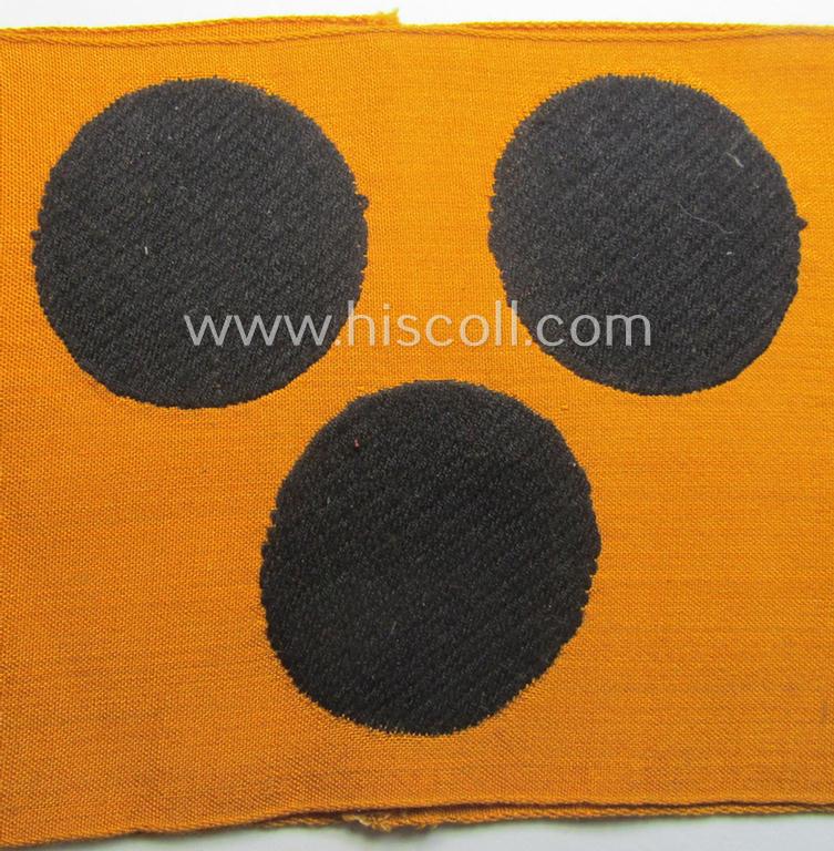 Armband (ie. 'Armbinde') depicting 3 black 'dots'  for war-blinded staff-members of the 'Deutsche Wehrmacht' (ie. 'Kriegsblinden')