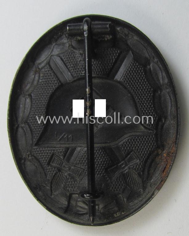 Neat, maker- (ie. 'L/11'-) marked example of a black-class wound-badge (or: 'Verwundeten-Abzeichen in Schwarz') being an example that was produced by the maker (ie. 'Hersteller') named: 'Wilhelm Deumer'