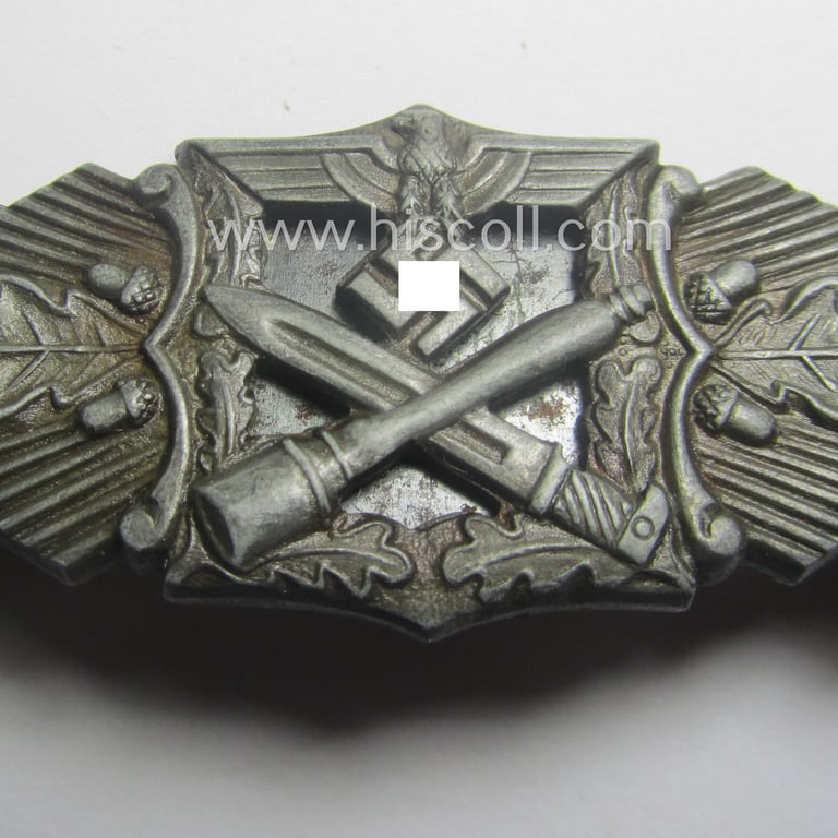 'Nahkampfspange in Bronze' (or: bronze-class close-combat clasp ie. CCC) being a neatly maker-marked- and/or minimally converse-shaped specimen as was produced by the: 'JFS'- (ie. 'Joseph Feix u. Söhne'-) company