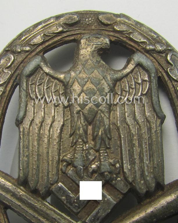 'Allgemeines Sturmabzeichen' (or: General Assault Badge ie. GAB) being a typical unmarked, zinc-based- (ie. 'Feinzink'-) and/or: 'semi-hollow-back'-version as was (I deem) produced by the: 'Rudolf Karneth'-company