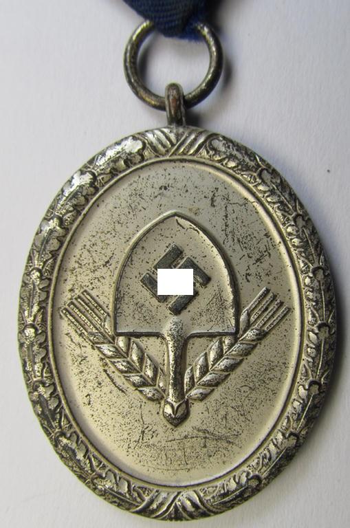 Attractive example of a: RAD (ie. 'Reichsarbeitsdienst') so-called: 'Dienstauszeichnung 3. Stufe für Männer' (as was intended for 12 years loyal-service) and that comes mounted on its period piece of ribbon (ie. 'Bandabschnitt')