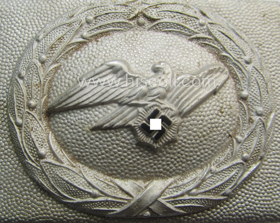 Unusually seen, RLB (ie. 'Reichsluftschutz-Bund'), aluminium-based, EM- (ie. NCO-) type belt-buckle (of the second pattern) being a (typical) non-maker-marked example