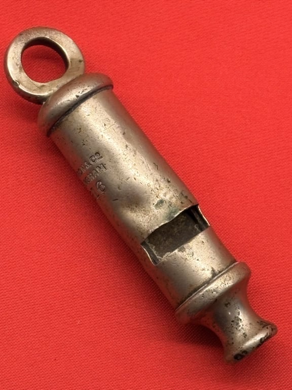 TWO AUTHENTIC ORIGINAL BRITISH OFFICERS WWI 1916 TRENCH WHISTLES AND LANYARD.
