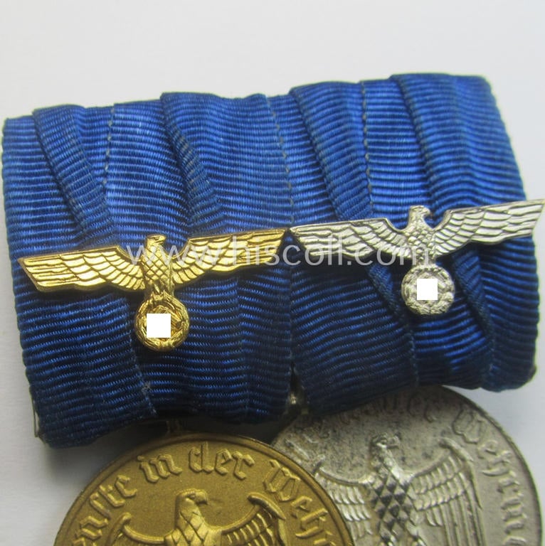 2-pieced medal-bar (ie. 'Spange') showing two: WH (Heeres o. Kriegsmarine) so-called: 'Dienstauszeichnungen für 4 u. 12 Jahre Treue Dienste' that both come period-mounted as a so-called: 'Doppelspange'