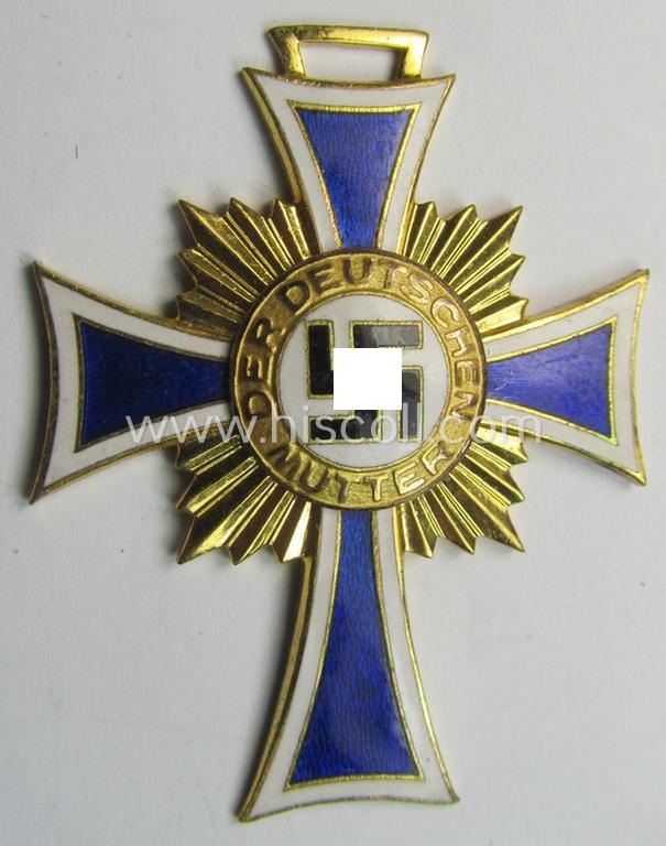 Superb, 'Ehrenkreuz der deutschen Mutter - erste Stufe' (or: golden-class mothers'-cross) being a 'virtually mint' example that comes with its accompanying, long-sized- (and also 'mint'!) ribbon as issued and/or recently found