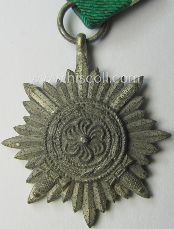 WH-related 'Tapferkeitsauszeichnung für Angehörige der Ostvölker, 2. Kl. in Silber mit Schwn.' (being a 'Feinzink'-based example that comes stored in its period pouch)