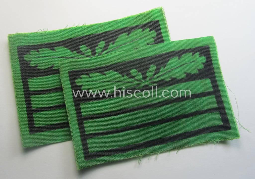 Pair of officers'-pattern, WH (Heeres o. Waffen-SS) rank-insignia-bars (for usage on the various camouflaged-uniforms) as was used by an officer holding the rank of: 'Hauptmann' (ie.: 'SS-Hauptsturmführer')