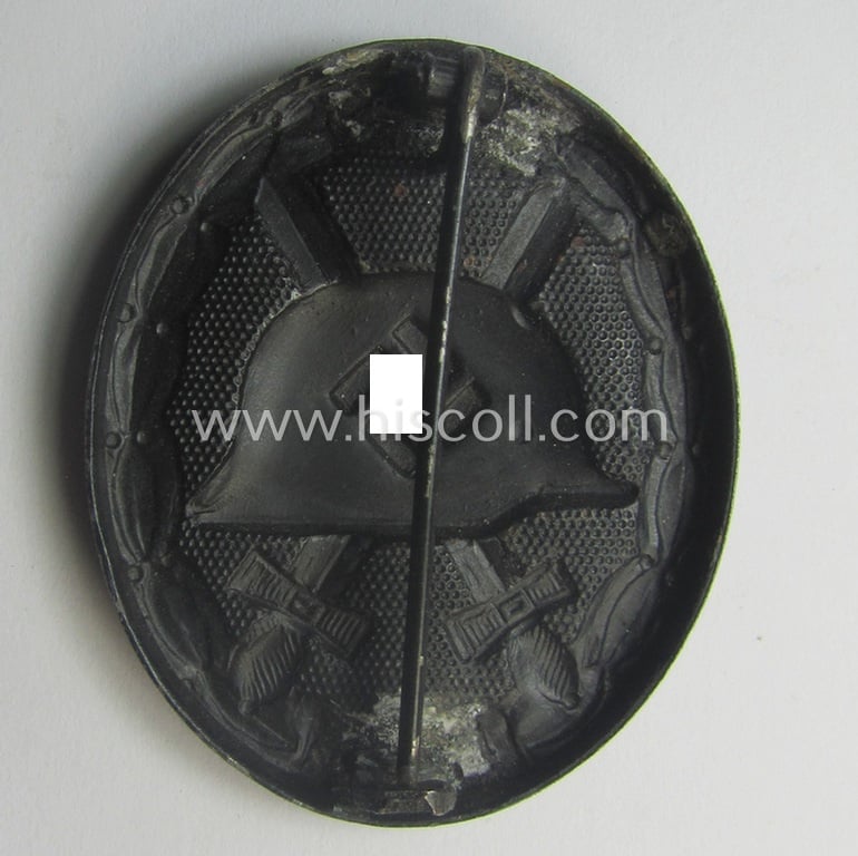 Neat - albeit non-maker-marked and typical magnetic! - example of a black-class wound-badge (or: 'Verwundeten-Abzeichen in Schwarz') that comes in an overall nice- (ie. I deem just minimally used-), condition