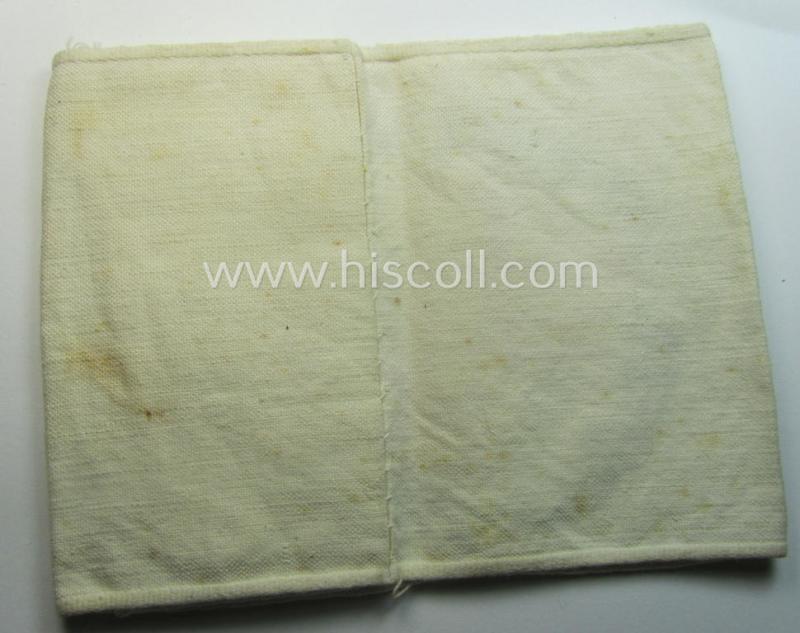 Linnen-based- and/or neatly 'machine-embroidered', beige-white-coloured DRK- (ie. 'Deutsches Rotes Kreuz'-) armband (ie. 'Armbinde') as was intended for the staff-members serving with the: 'Deutsches Rotes Kreuz' (or: German Red Cross)