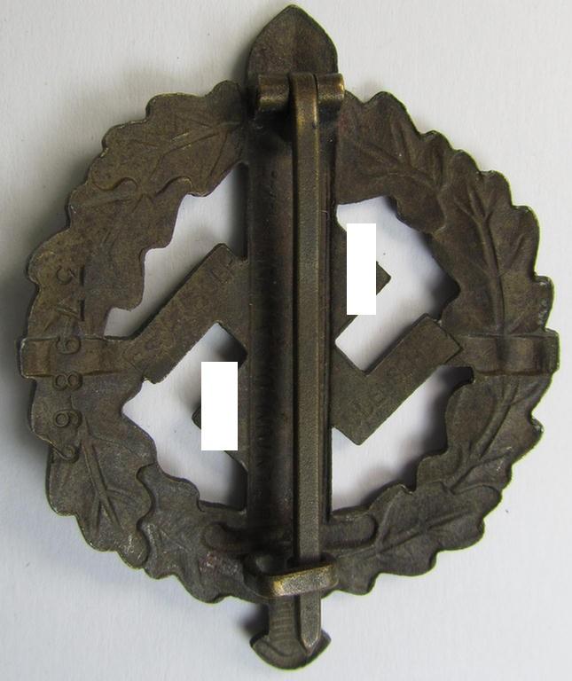 Early- (ie. pre-) war-period 'SA Sportabzeichen in Bronze' being a nicely maker- (ie. 'E. Schneider'-) marked example that bears a unique, stamped bearers'-number that reads: '379862' on its back