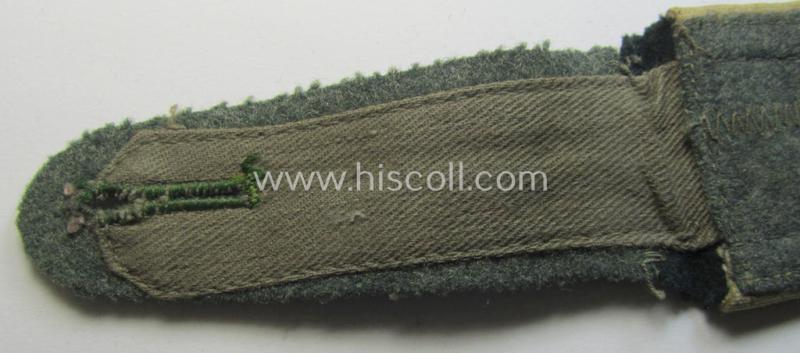 Single, early-war-period so-called: 'M36 o. M40'-pattern WH (Heeres) NCO-type shoulderstrap as piped in the white-coloured branchcolour as was intended for usage by an: 'Unteroffizier der Infanterie-Truppen'