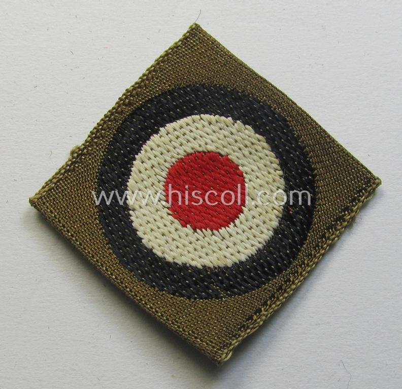 Superb, WH (Heeres) 'tropical-issue' (ie. DAK or: 'Deutsches Afrika Korps'-related-) side-cap-eagle and dito cocarde-set as executed in 'BeVo'-weave-pattern (both insignia-pieces coming in an overall very nice- ie. 'virtually mint' condition)