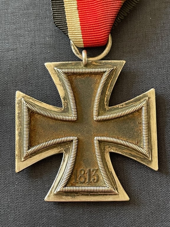 WWII GERMAN IRON CROSS 2ND CLASS NUMBERED RING 24 FOR ARBEITSGEMINSCHAFT FUR HEERESHEDARF IN DER GRAVEUR UBD ZISELIERUNG