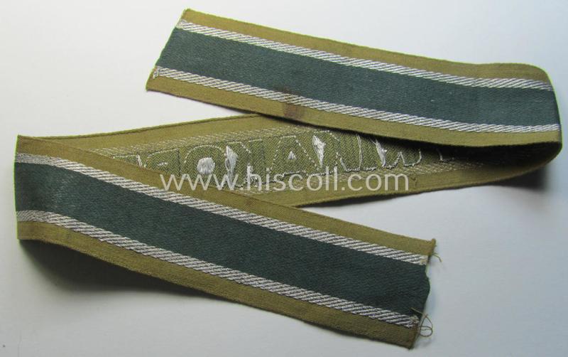 Superb, 'BeVo'-like cuff-title (ie. 'Ärmelstreifen') entitled: 'Afrikakorps' being a presumably issued but never worn example that comes in an overall very nice- (ie. non-shortened- and never tunic-attached-), condition