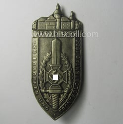 Commemorative, silverish-toned and/or tin-based: 'N.S.K.O.V.'- (ie. WWI-veteran-) related...