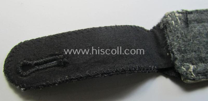 Superb - albeit regrettably single! - Waffen-SS NCO-type shoulderstrap as piped in the white-coloured branchcolour as was intended for usage by an: 'SS-Unterscharführer' who served within the: 'Waffen-SS Infanterie-Truppen'