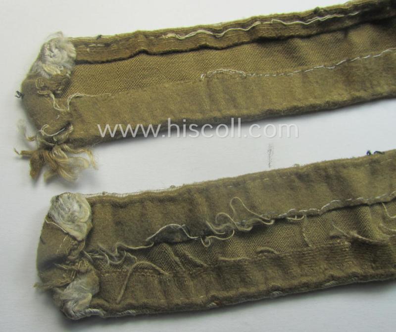 WH cuff-title (ie. 'Ärmelstreifen') entitled: 'Afrika' (being a minimally shortened example that comes in an overall very nice- (ie. issued and clearly worn ie. once tunic-attached-), condition