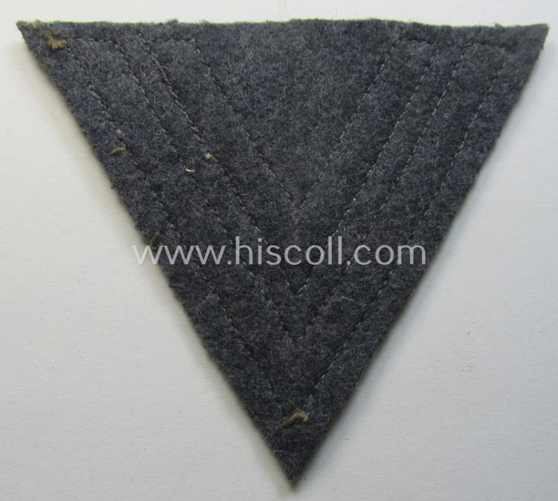 WH (Luftwaffe) 'Armwinkel' (or: arm-chevron) as executed on typical bluish-grey-coloured wool as was specifically intended for usage by a soldier with the rank of: 'Obergefreiter'