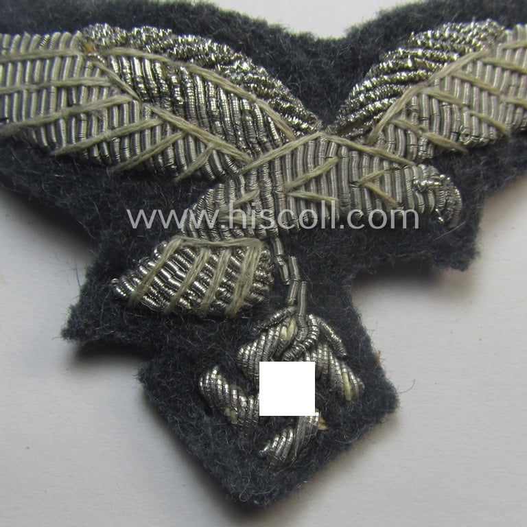 WH (Luftwaffe) officers'-pattern visor-cap-eagle (ie. 'Adler für LW-Offiziers-Schirmmütze') being a neatly hand-embroidered example of the: 'Extra Qualität' that comes in a moderately used- (ie. carefully cap-removed-), condition