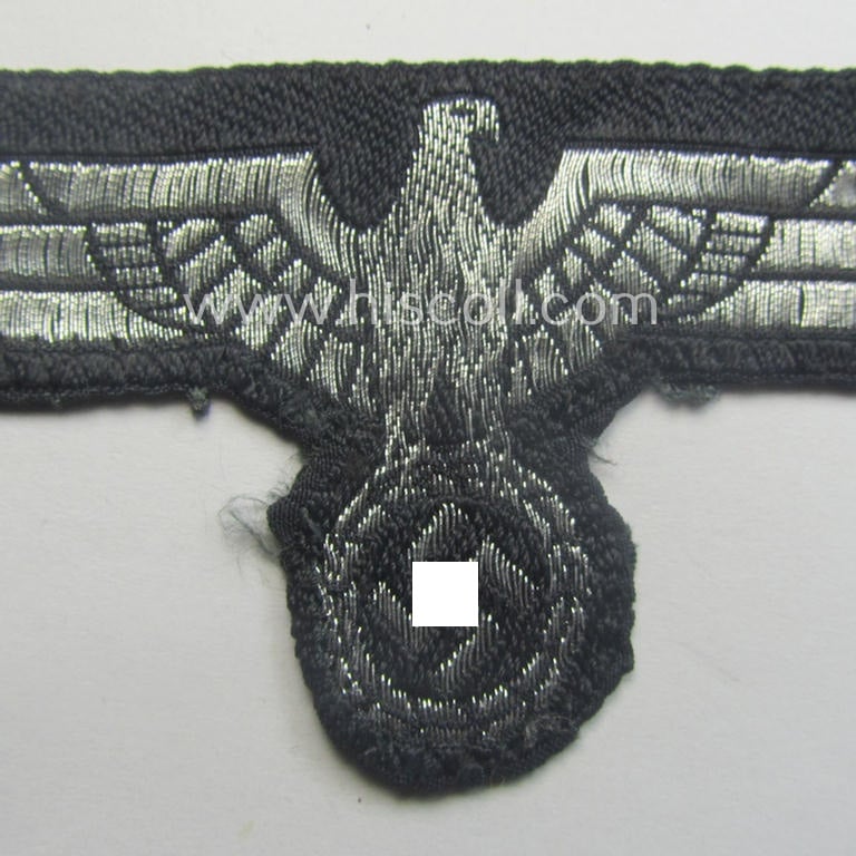Superb - truly used and tunic-removed - WH (Heeres Pz) 'flatwire'-woven, officers'-type breast-eagle (ie. 'Brustadler für Offiz.) as executed in silverish-coloured braid as was intended for usage on the officers'-pattern 'wrap-around'-tunics