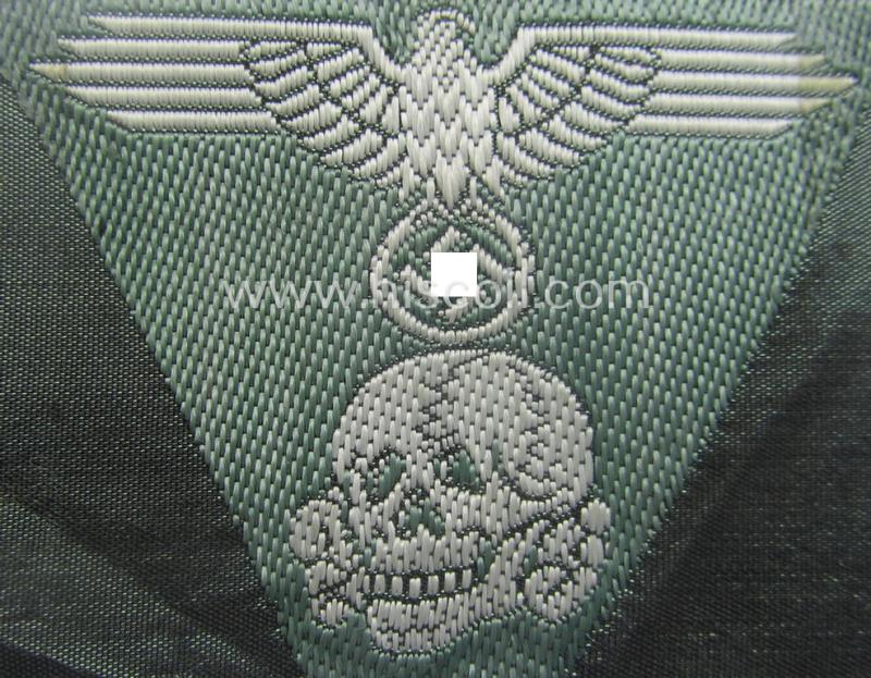 Superb - and simply never used nor cap-attached - Waffen-SS field-grey-coloured, M43-pattern cap-trapezoid as was intended for usage on the M43-model field-caps (ie. 'Einheitsfeldmützen') that comes in a 'virtually mint- ie. unissued', condition