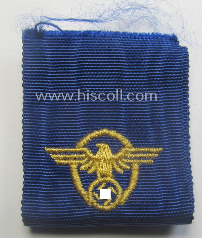 Golden-class 'Pol.-Dienstauszeichnung 1. Stufe' (or: police loyal-service medal first-class) that comes stored in its period, green-coloured (and luxuriously styled!) etui and that comes with its accompanying ribbon (ie. 'Bandabschnitt')