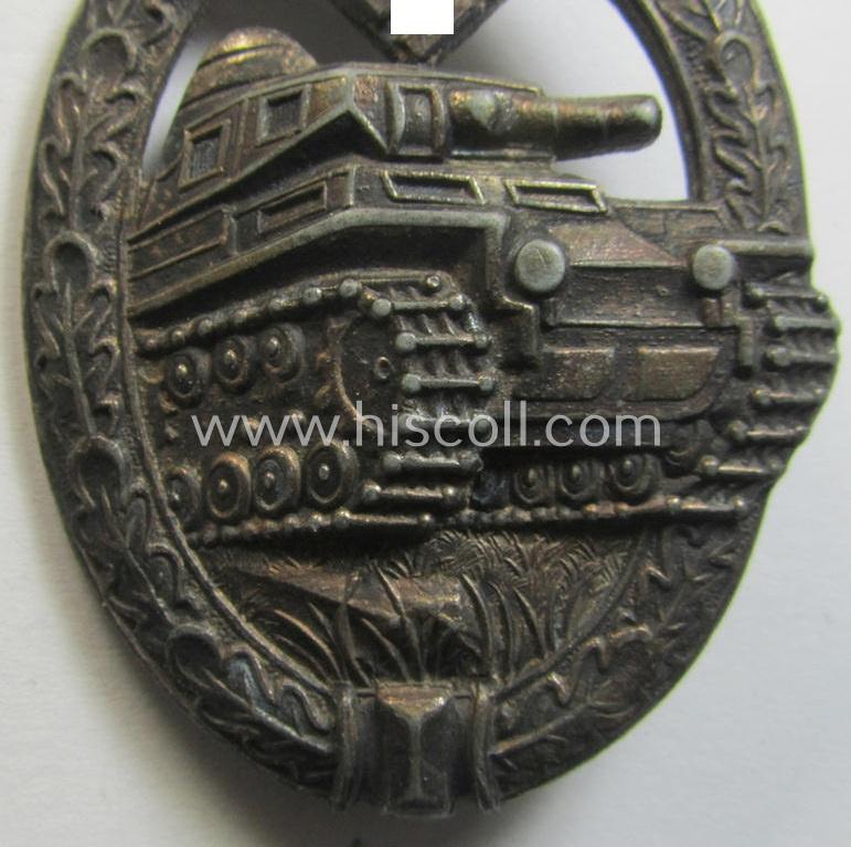 Moderately used 'Panzerkampfabzeichen in Silber' (or: silver-class panzer-assault badge or PAB) being a clearly maker- (ie. 'AS' in a triangle-) marked- and/or typical zinc- (ie. 'Feinzink'-) based specimen as was procuced by a to date unknown...