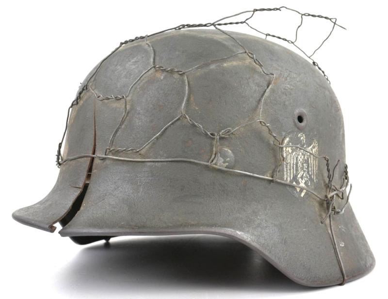 German WH M40 SD Combat Helmet with Battle damage and Half Wire Basket