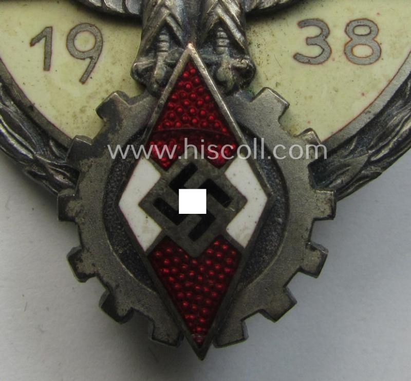 'Buntmetall'-based, 'HJ'- (ie. 'BDM'-) related so-called: 'Reichsberufswettkampf-Siegerabzeichen' (of the 2nd model) entitled: 'Gausieger 1938' and being a neatly maker- (ie.: 'G. Brehmer'-) marked example