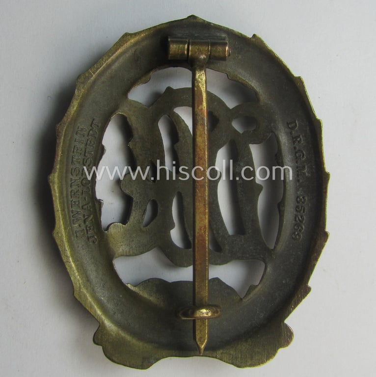 'Reichssportabzeichen DRL in Bronze' by: 'Wernstein' that came stored in its (unusally seen!) red-coloured (and maker- ie. 'Preussische Staatsmünze - Berlin'-marked pouch as issued and found