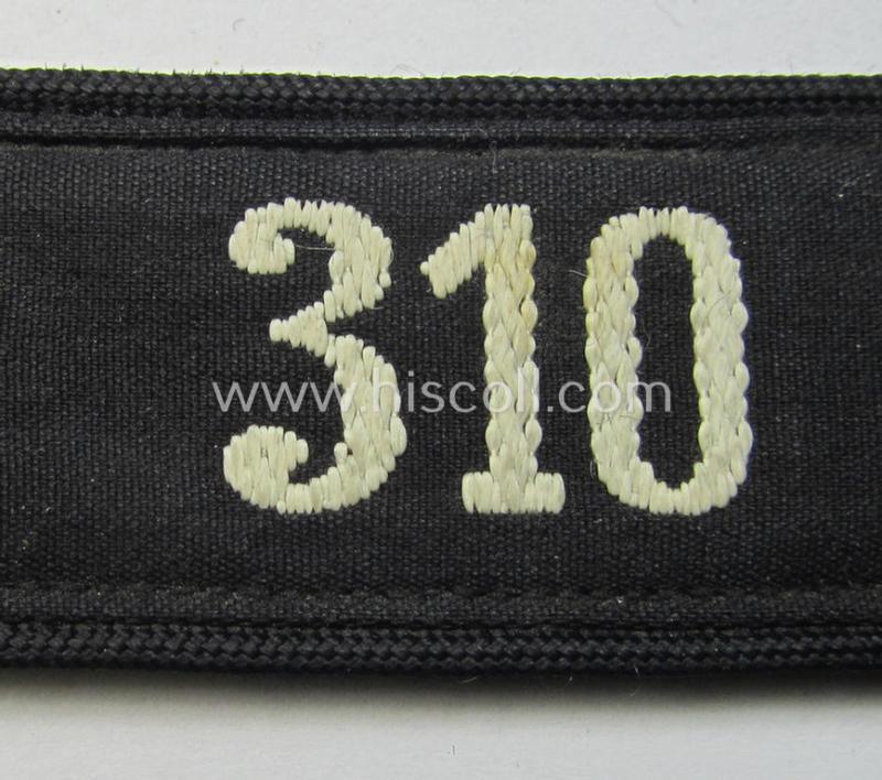 Neat - and naturally single! - black-piped 'DJ- o. Deutsches Jungvolk' shoulderstrap as was intended for usage by a: 'DJ-Mitglied' who served within the: 'Bann 310' (310 = 'Donau') and that comes with its period-attached 'RzM'-etiket