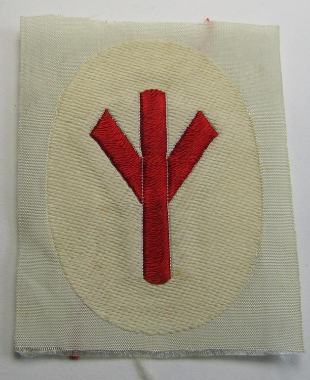 Superb, HJ/BDM (ie. 'Hitlerjugend'/'Bund Deutscher Mädel') trade- or specialist armbadge as executed in neat 'BeVo'-weave pattern as was intended for usage by a: 'Feldscher' (or: medical orderly) still retaining its period 'RzM'-etiket