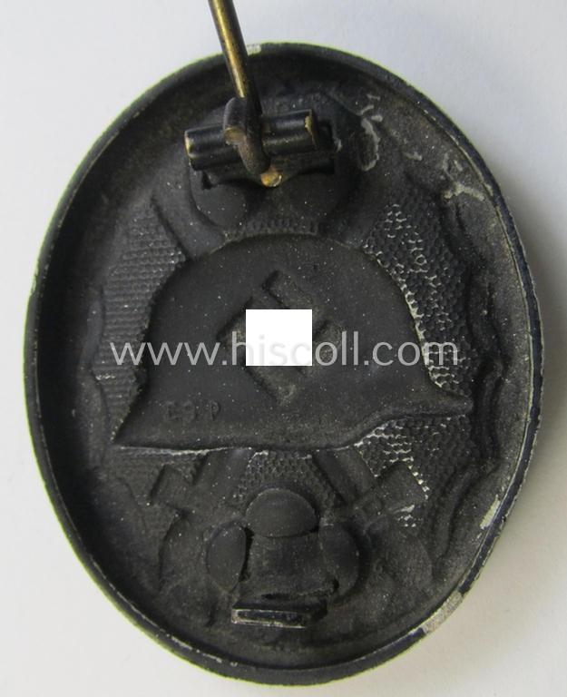 Superb - and very unusually seen! - maker- (ie. 'ES.P'-) marked example of a black-class wound-badge (or: 'Verwundeten-Abzeichen in Schwarz') being an example that was produced by the maker (ie. 'Hersteller') named: 'Eugen Schmidthaussler'