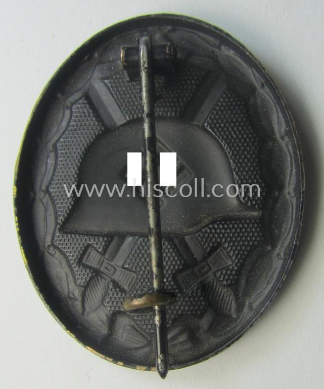 Moderately used- and/or worn, black-class wound-badge (or: 'Verwundeten-Abzeichen in Schwarz') being a typical non-magnetic and/or non-maker-marked example