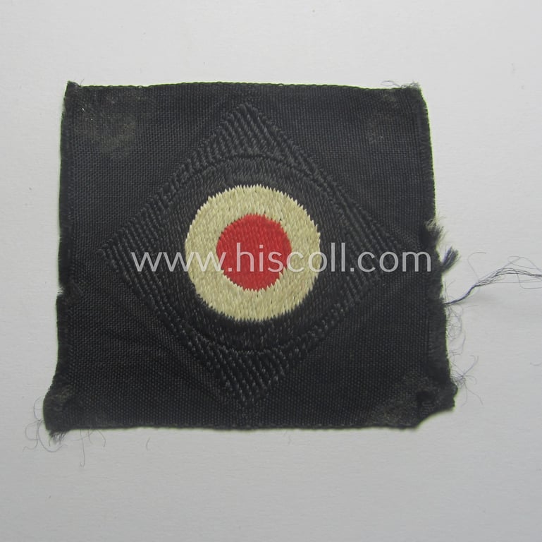 Early- (ie. pre-) war-period, WH (Heeres) 'Panzer' cap-eagle & cocarde-set (ie. 'Schiffchenmützen-Adler u. Kokarde-Satz für Mannschaften u. Uffz.') being a 'virtually mint' set as executed in white-coloured linnen onto a black-coloured background